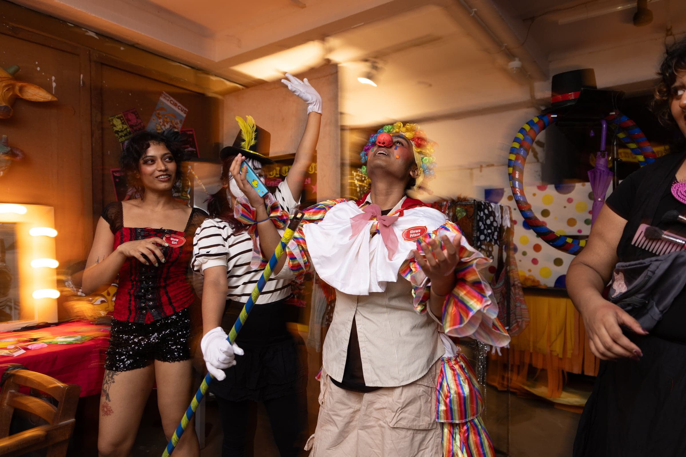 Circus characters gathered inside the set
