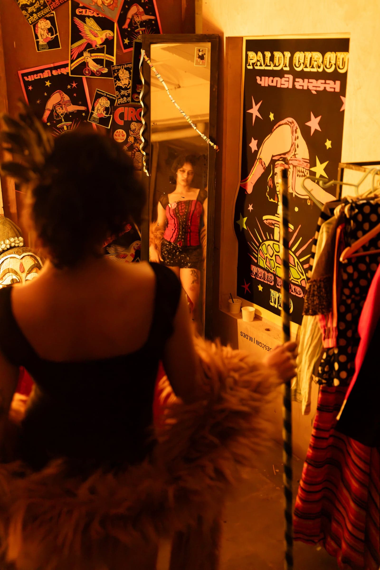 Circus character reflected in a dressing-room mirror