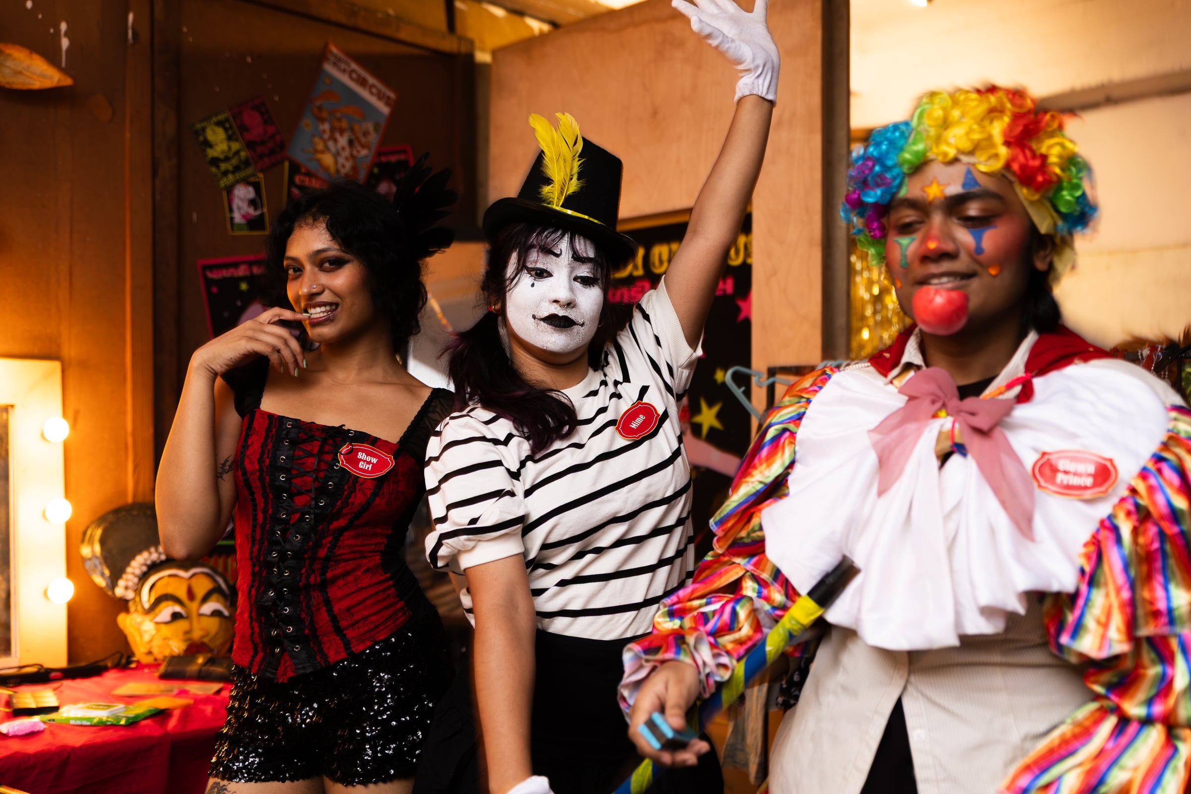 Three Great Paldi Circus performers posing inside the immersive set