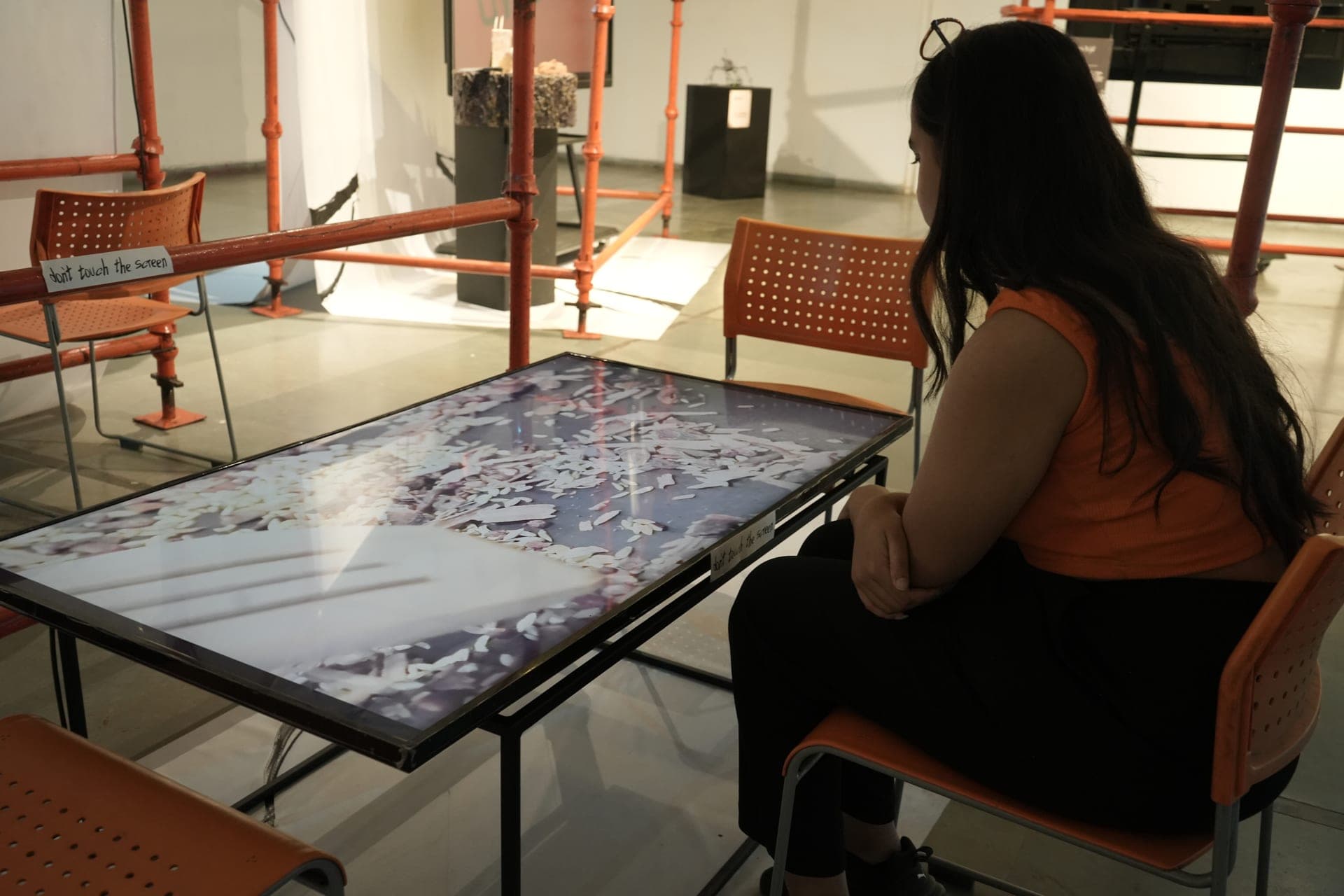 Visitor using an interactive table work
