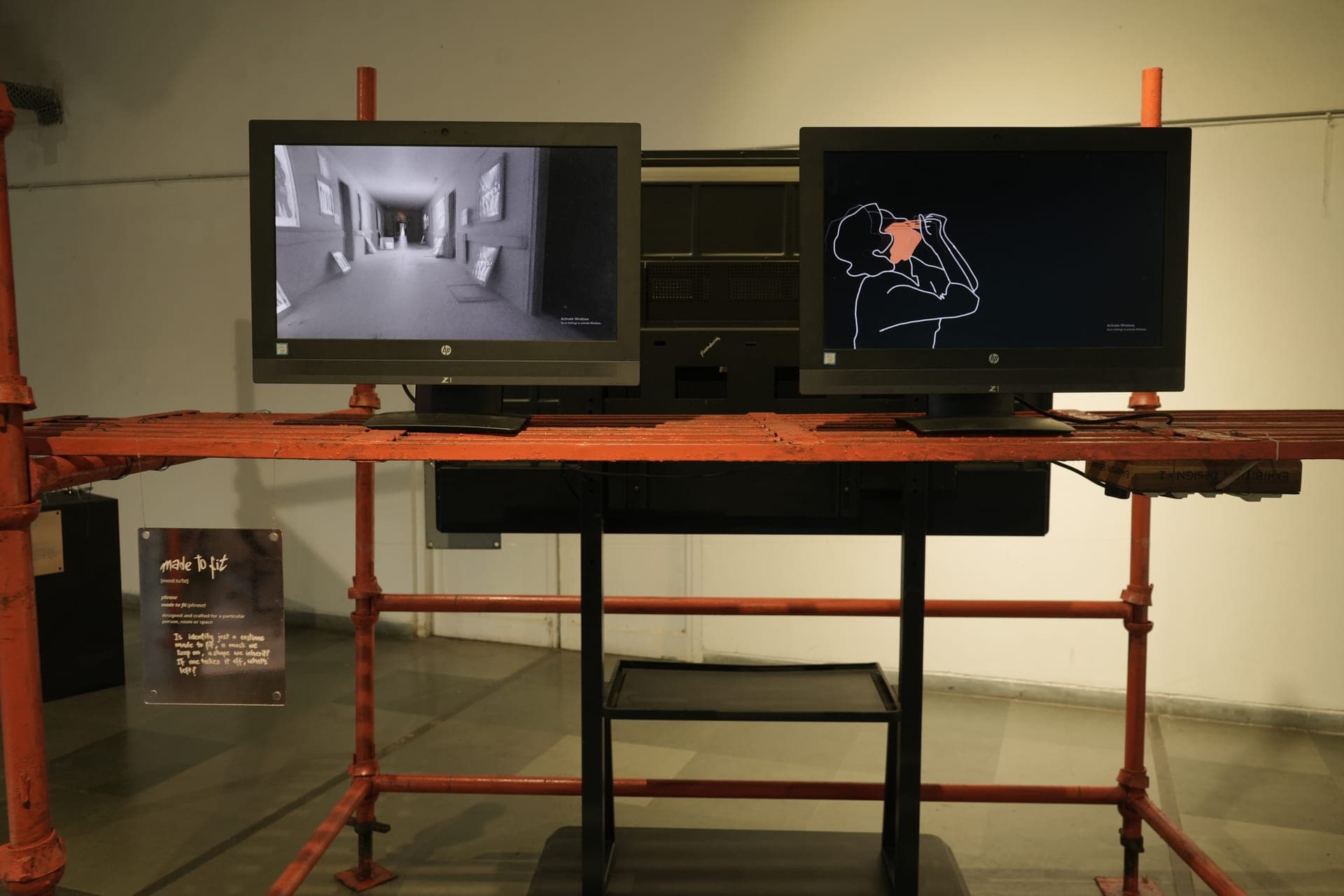 Multiple moving-image works displayed together