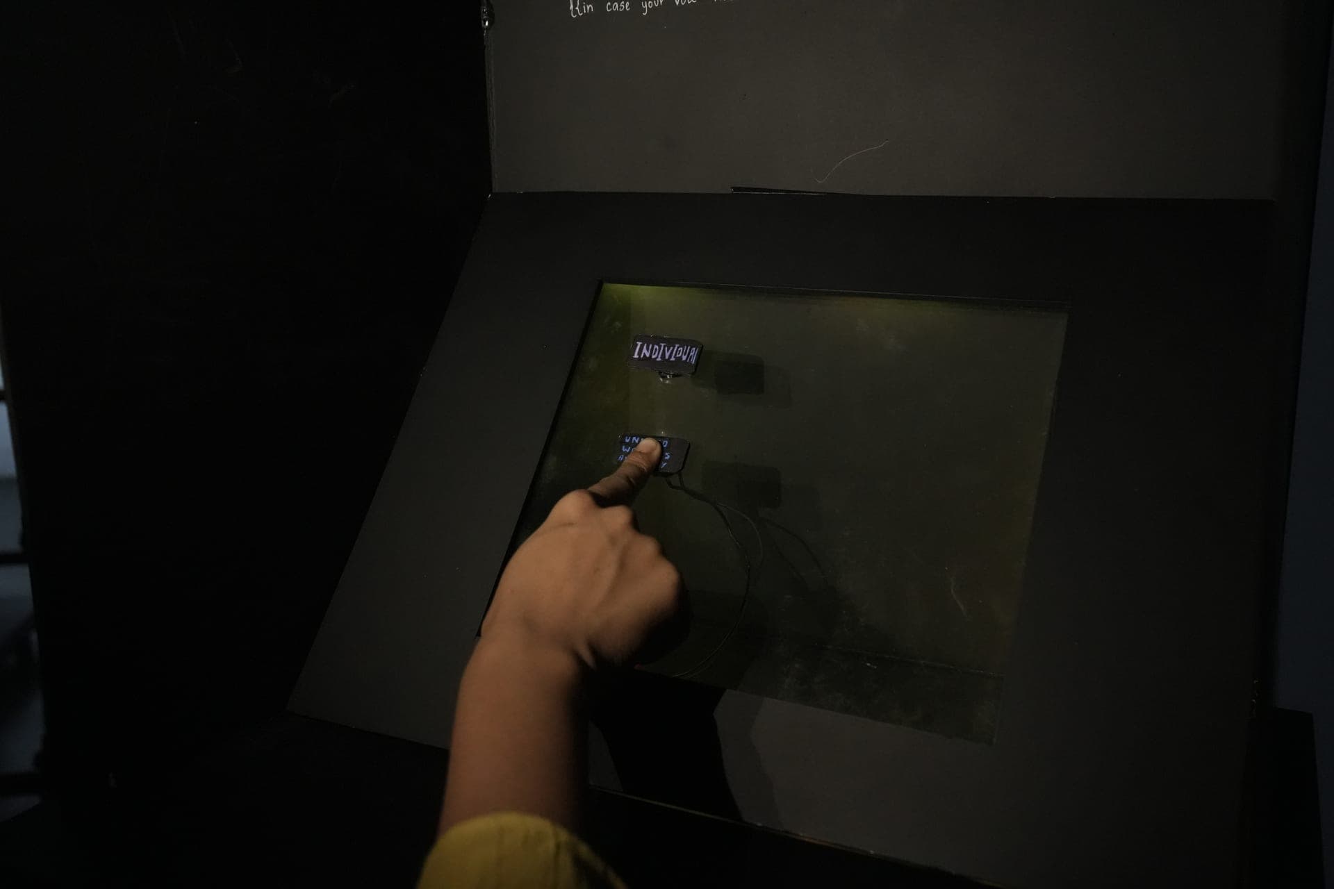 Visitor interacting with a digital exhibition work