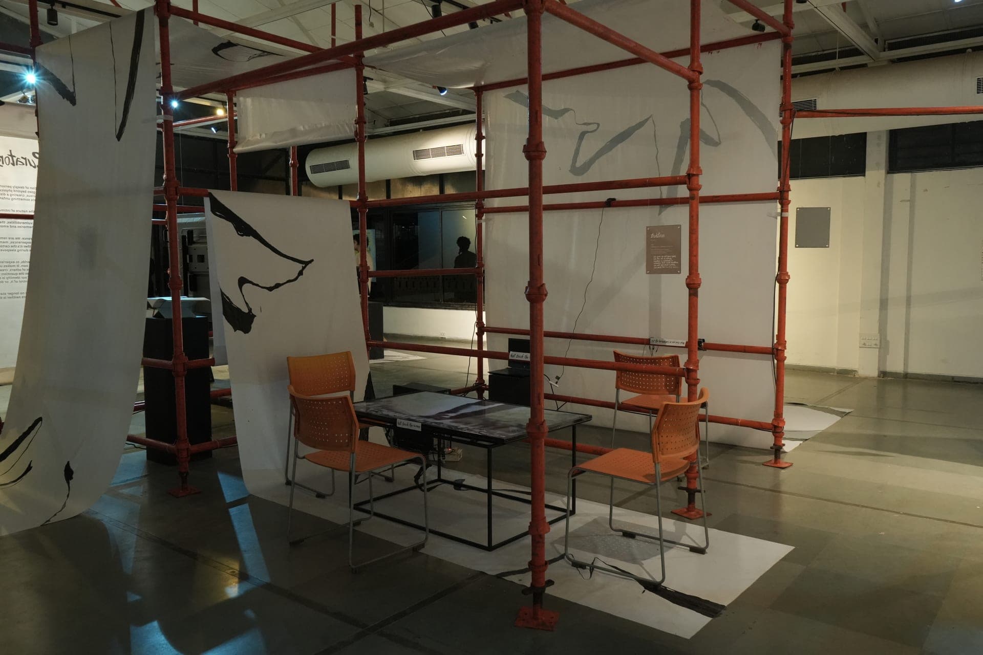 Visitor moving through the exhibition space