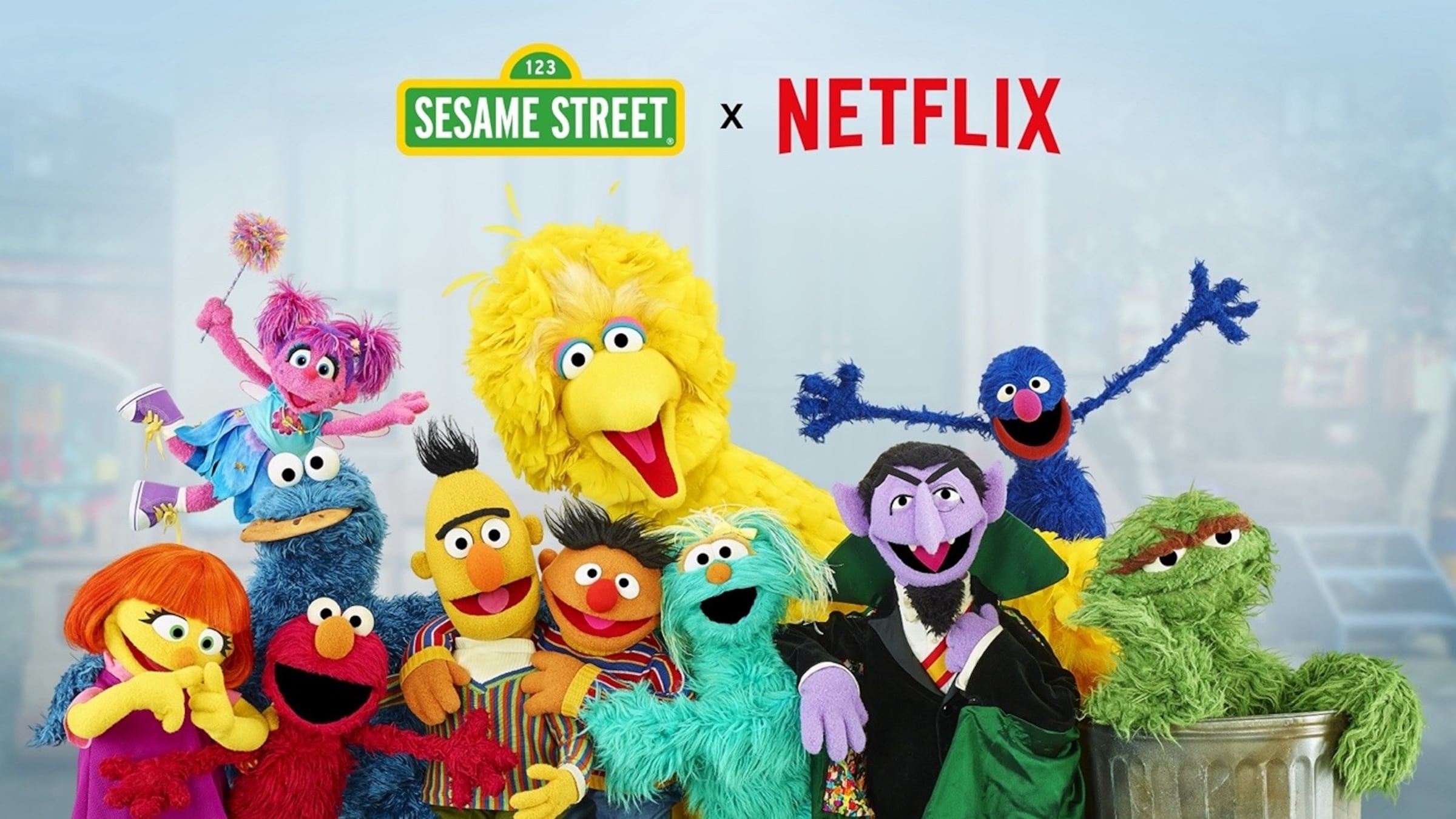 Sesame Street characters gathered together in a colourful ensemble scene