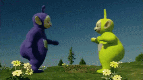 Teletubbies moving together in a playful television scene